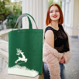 Red haired girl with red handbag posed near vintage house.