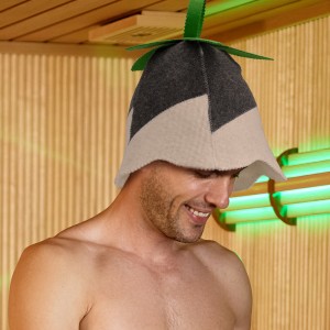 Happy couple enjoying in sauna treatment at health spa.