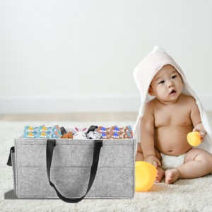 Baby in a bath towel with rubber ducks