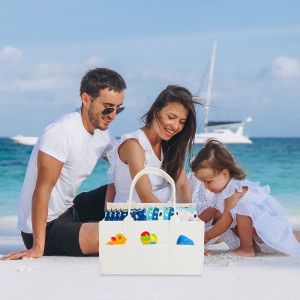 Young family with little daugher on a vacation by the ocean