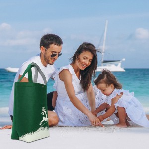 Young family with little daugher on a vacation by the ocean