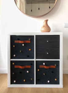 Colorful ball embellishments and square felt storage add customized fun to your space.